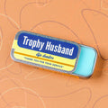 Trophy Husband blue raspberry lip balm in an old school metal tin by Whiskey River Soap Co., from The Ruddy Duck in Whitefish, Montana