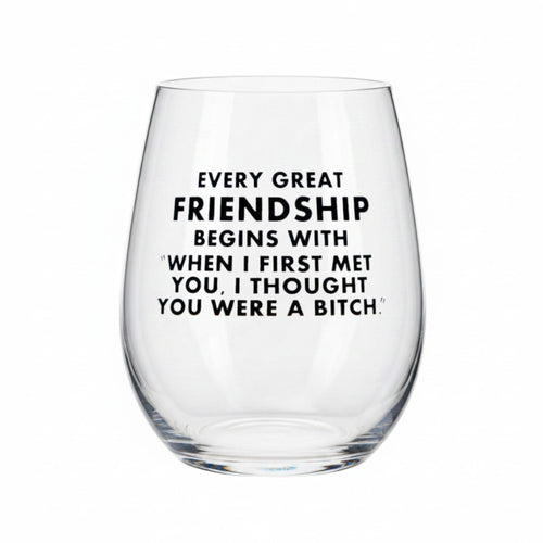 Clear wine glass with humorous text on a white background