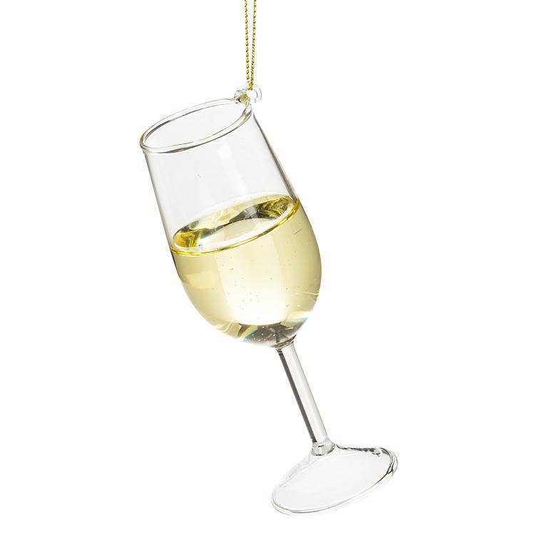 Glass white wine ornament, a tilted wine glass with a golden pour and gold hanging cord, from The Ruddy Duck in Whitefish, Montana