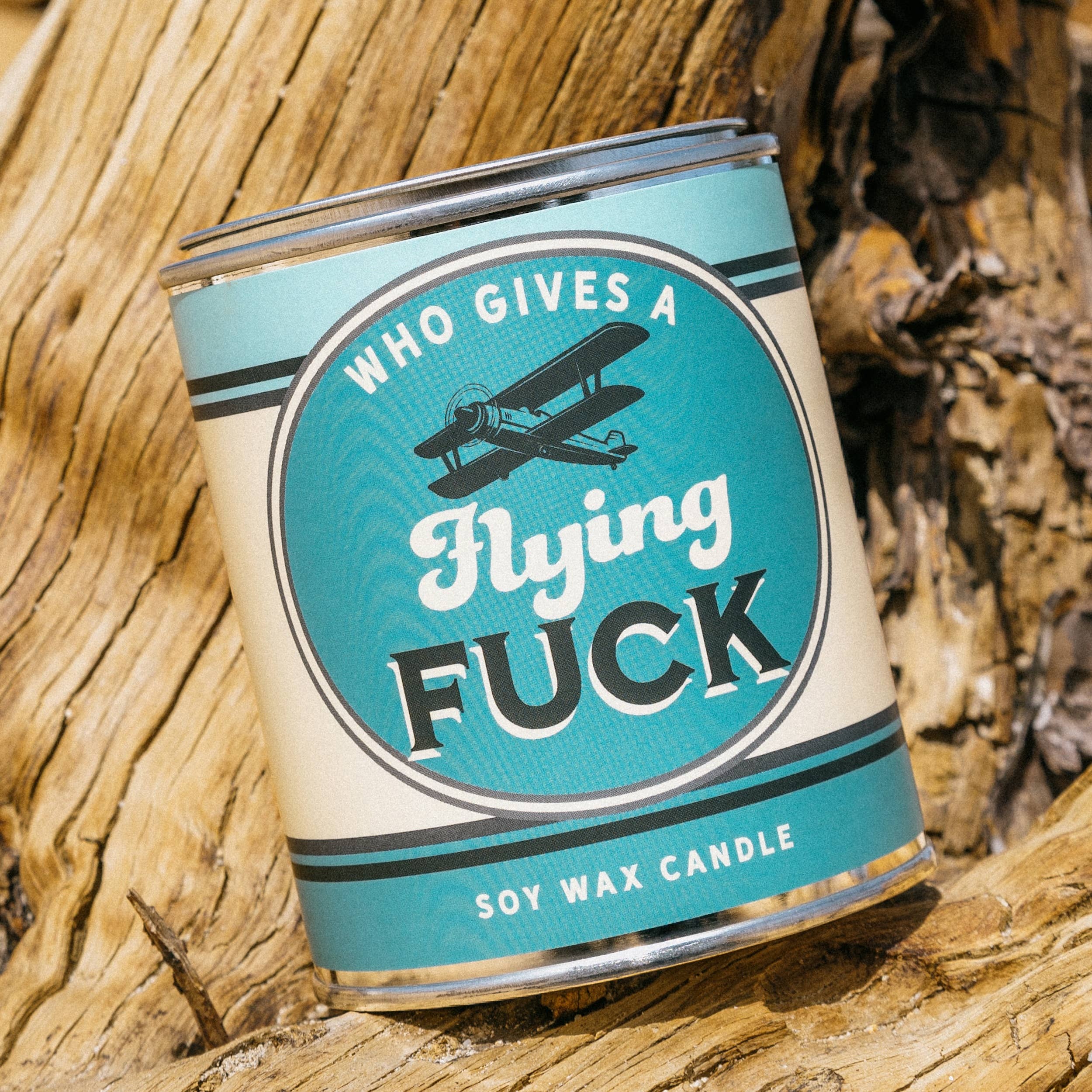 Who Gives a Flying Fuck vintage paint can candle with blackberry, amber, and sweet tobacco notes, by Whiskey River Soap Co., from The Ruddy Duck in Whitefish, Montana
