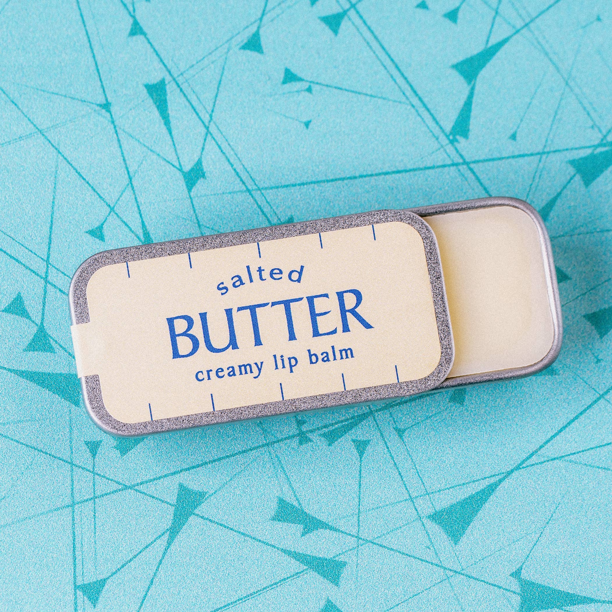 Salted Butter creamy vanilla lip balm in an old school metal tin by Whiskey River Soap Co., from The Ruddy Duck in Whitefish, Montana