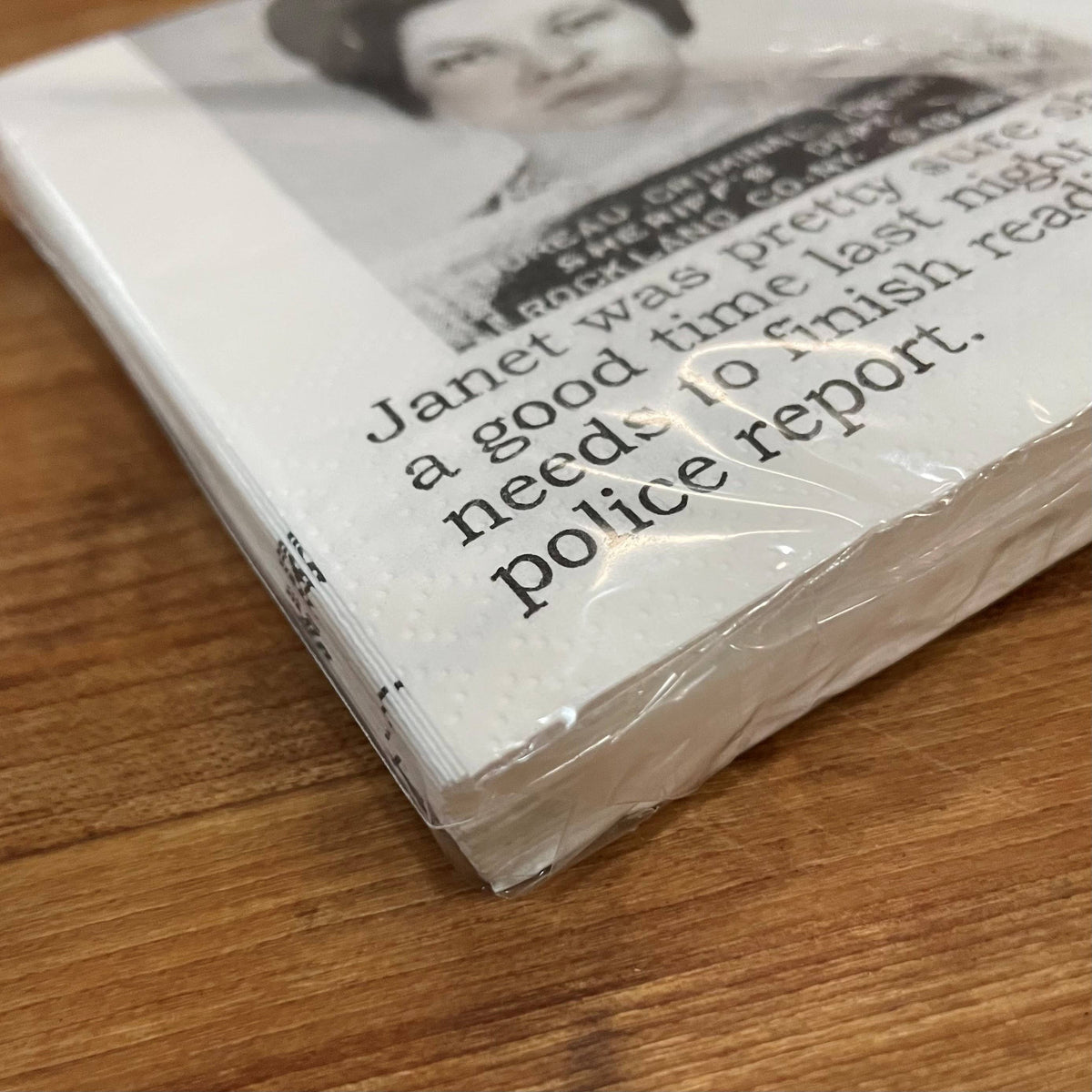 Janet's Police Report funny mugshot cocktail napkins, pack of 20, from The Ruddy Duck in Whitefish, Montana