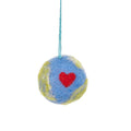 Needle felted planet Earth hanging decoration in blue and green wool, from The Ruddy Duck in Whitefish, Montana
