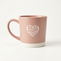 Pink mug with 'Best Mom Ever' text on a white background