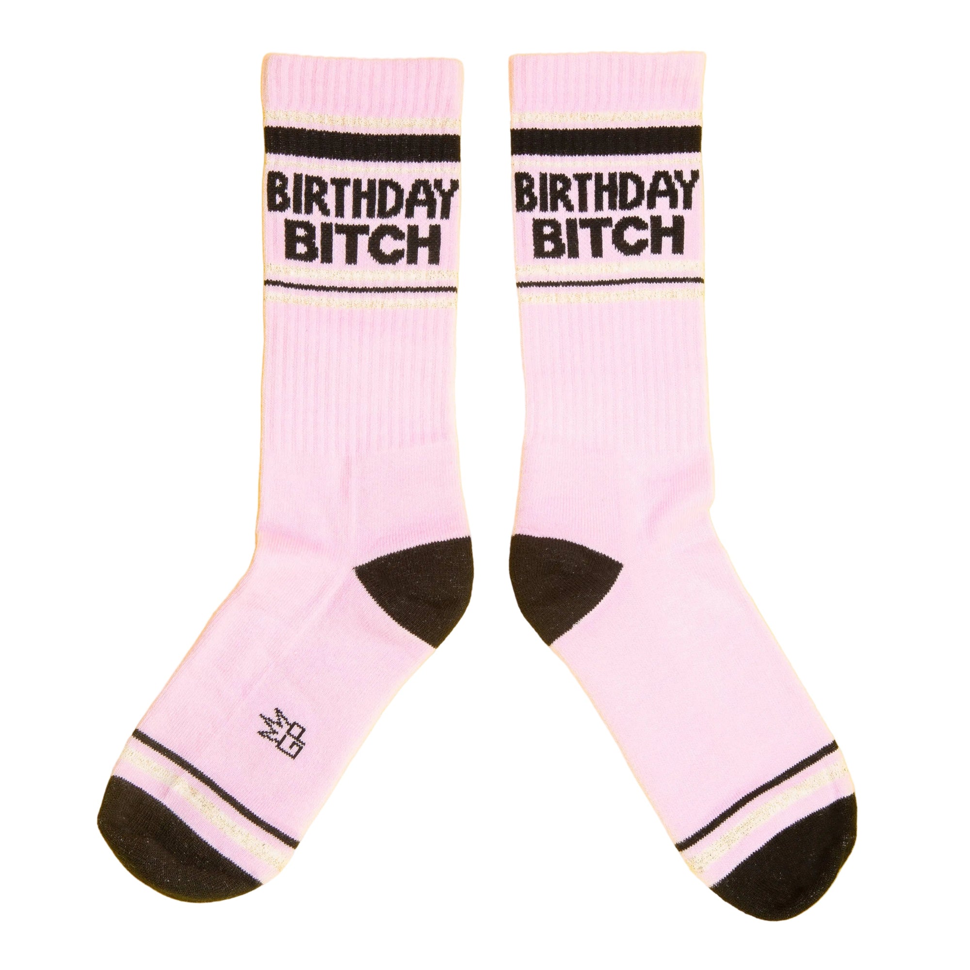 Pink socks with 'Birthday Bitch' text on a yellow background