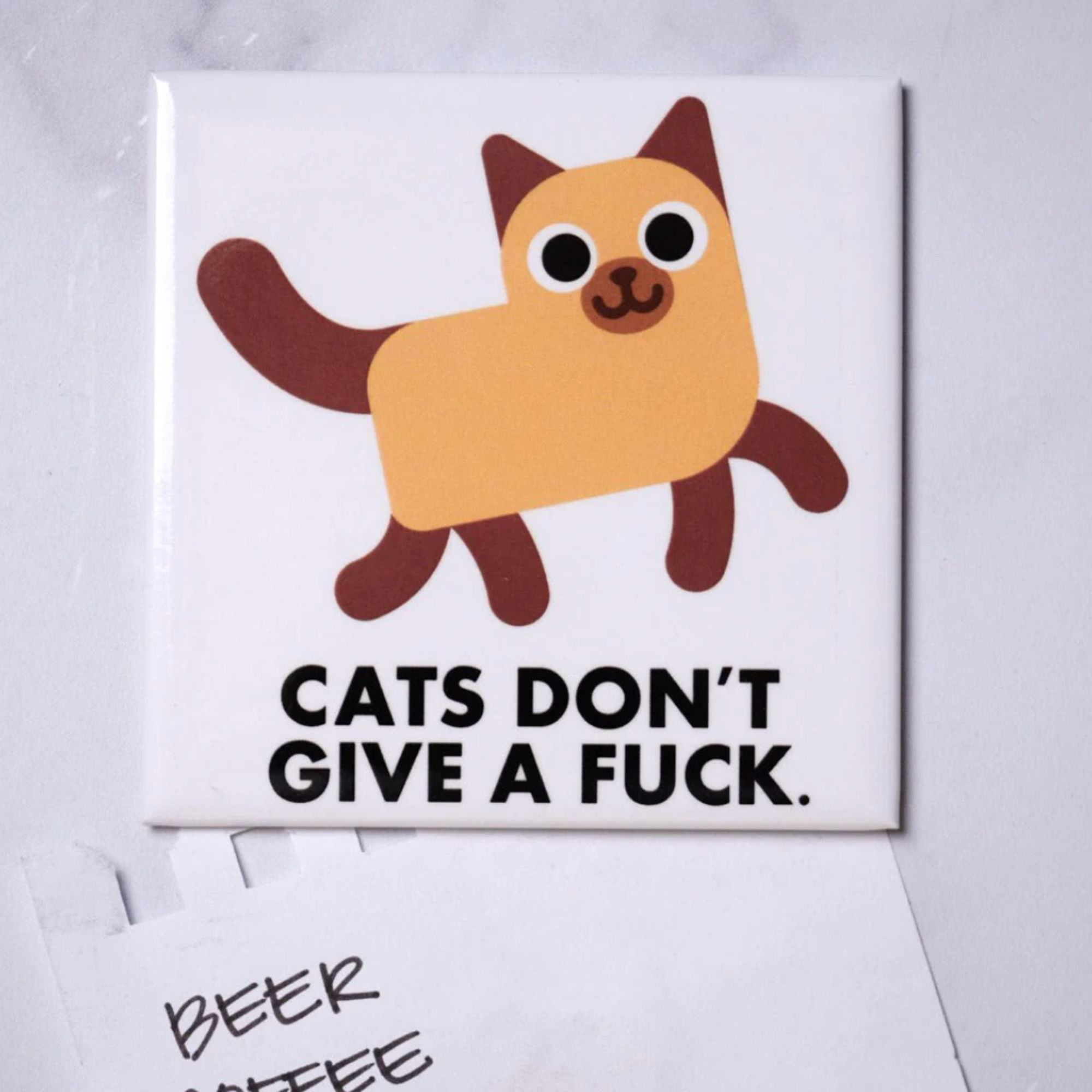 Card with a cartoon cat and text 'Cats don't give a fuck' on a white background