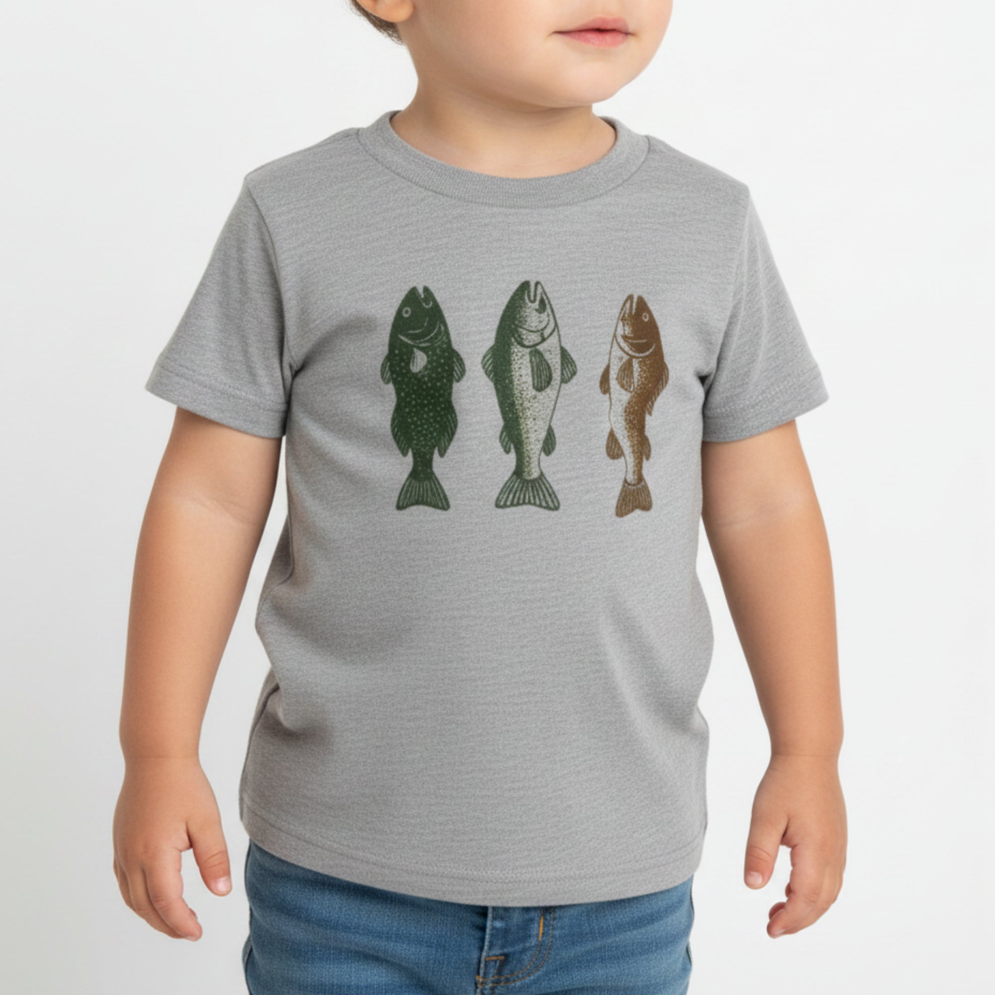 Gray t-shirt with fish illustrations on a white hanger against a light gray background