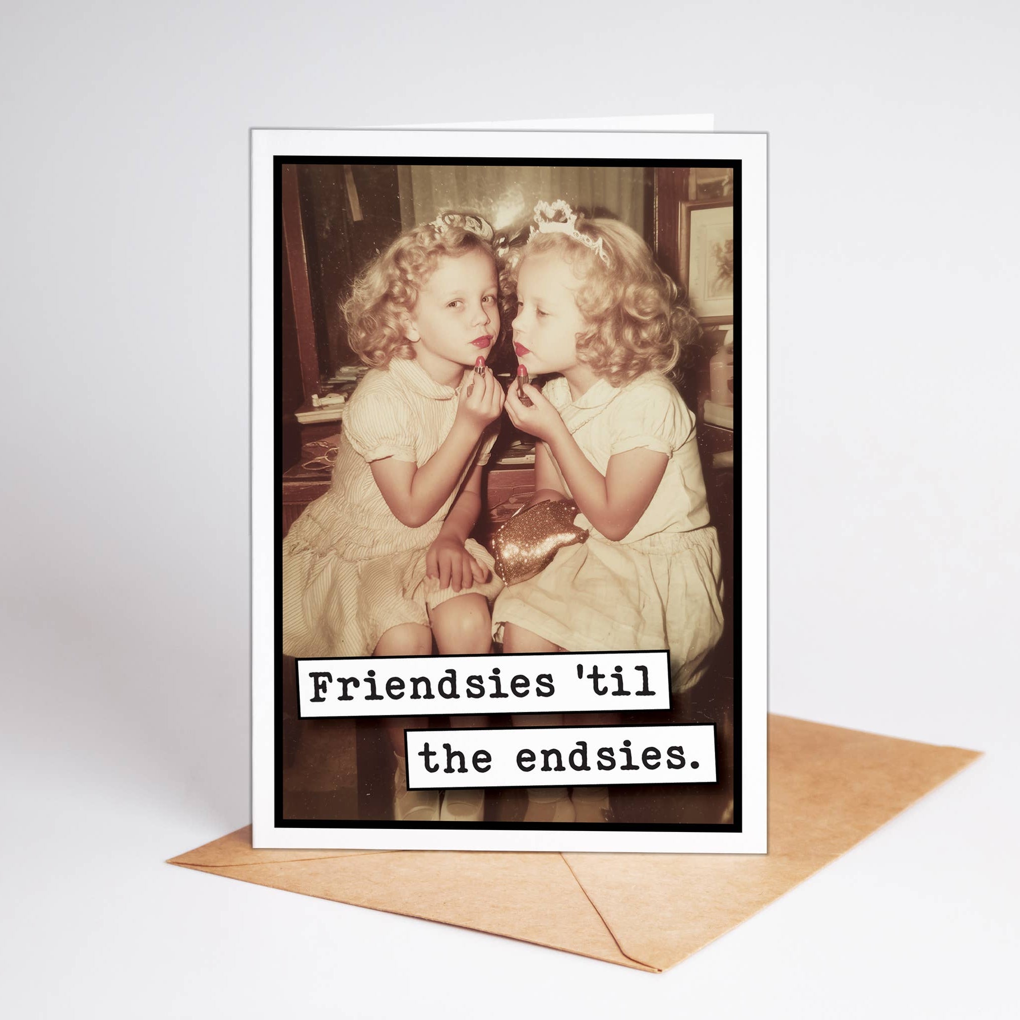 Vintage-style greeting card with two children and text 'Friendsies 'til the endsies' on a white background.