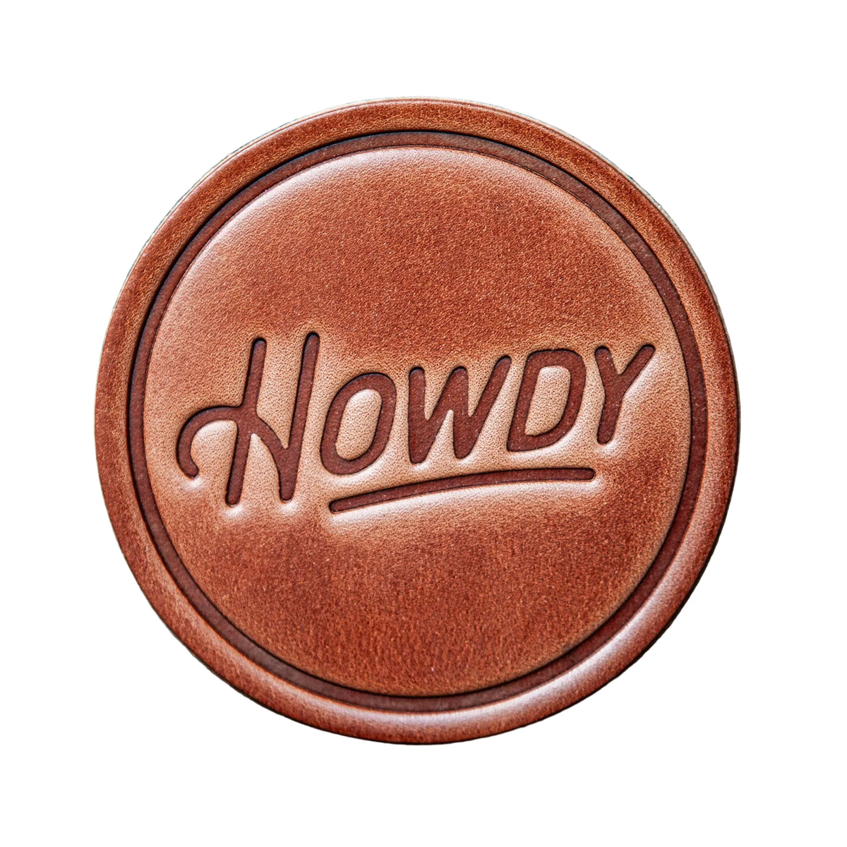 Howdy 4 inch leather coaster from The Ruddy Duck in Whitefish, Montana
