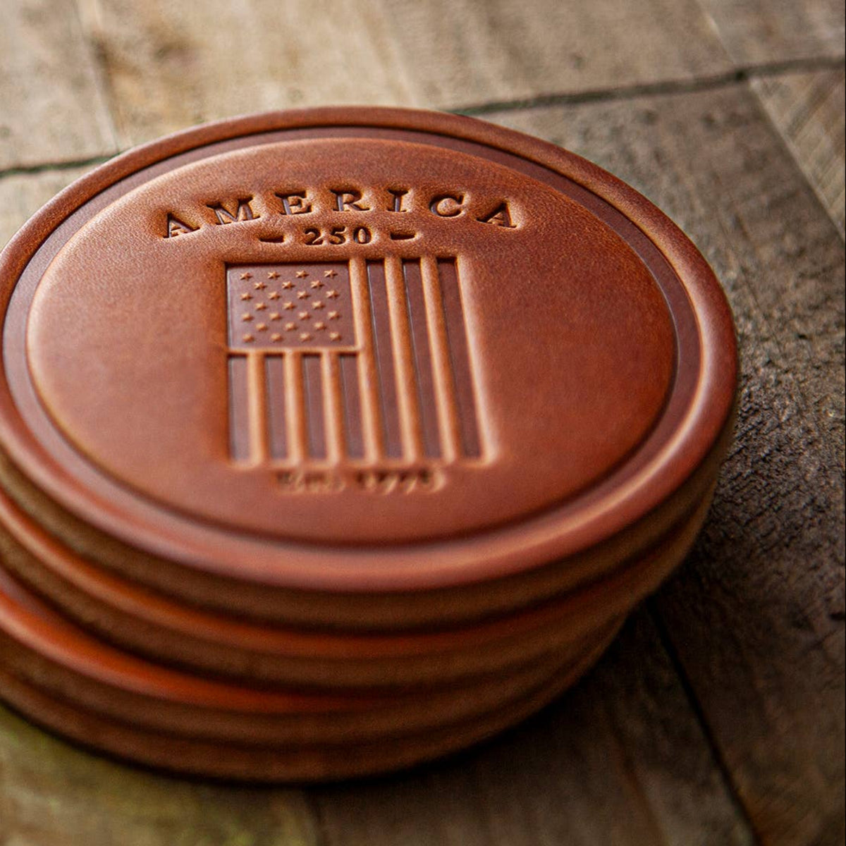Montana American flag 4 inch leather coaster from The Ruddy Duck in Whitefish, Montana, alternate view