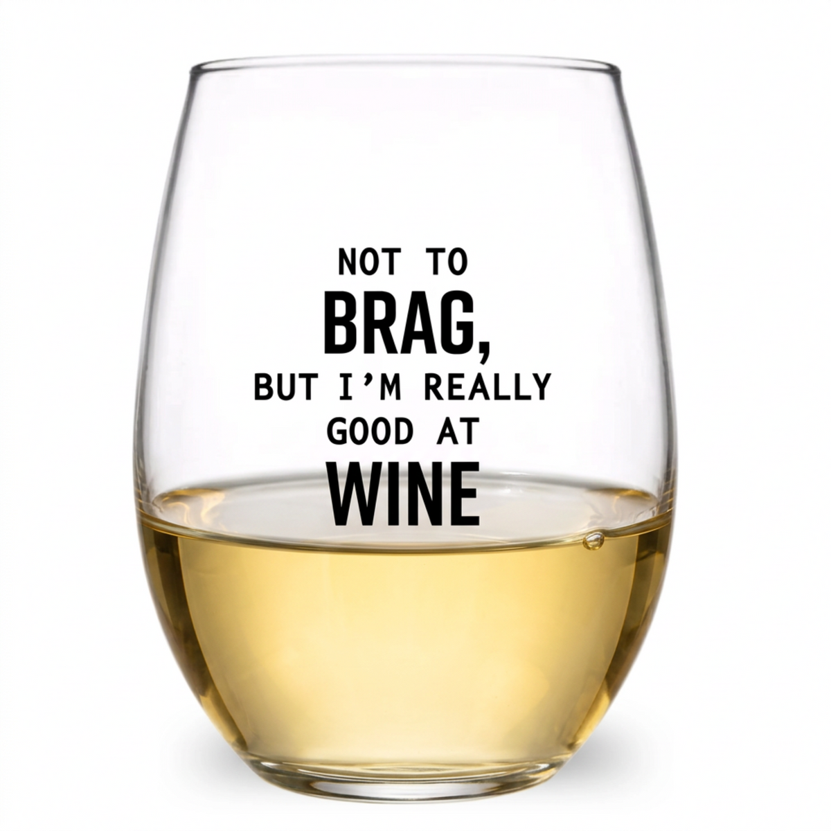 A clear stemless wine glass with black printed text that reads 'NOT TO BRAG, BUT I'M REALLY GOOD AT WINE' on a white background.