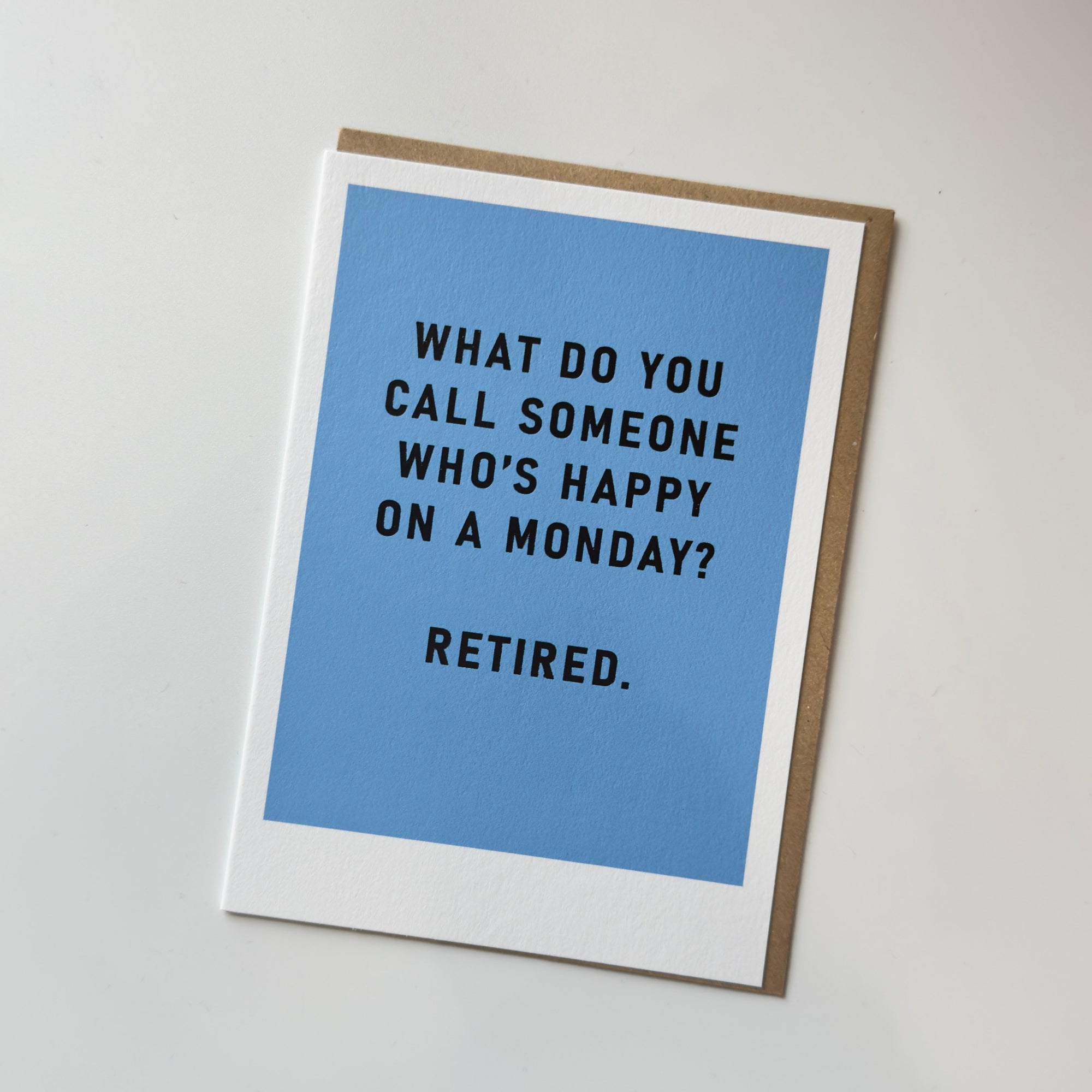 Greeting card with humorous text on a blue background