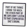 Sign with humorous text on a wooden surface
