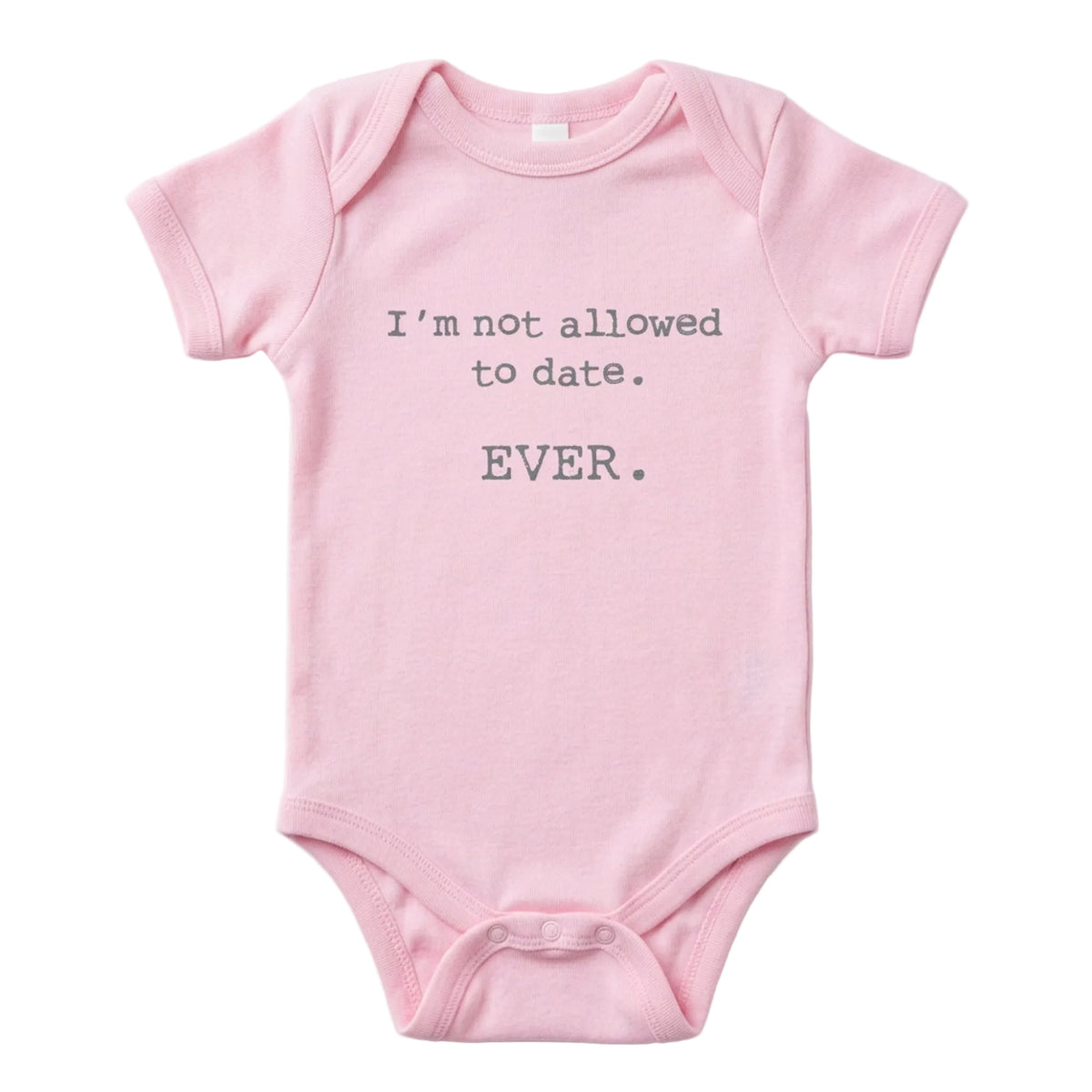 Pink baby onesie that says I'm Not Allowed to Date. Ever. in gray typewriter lettering, from The Ruddy Duck in Whitefish, Montana