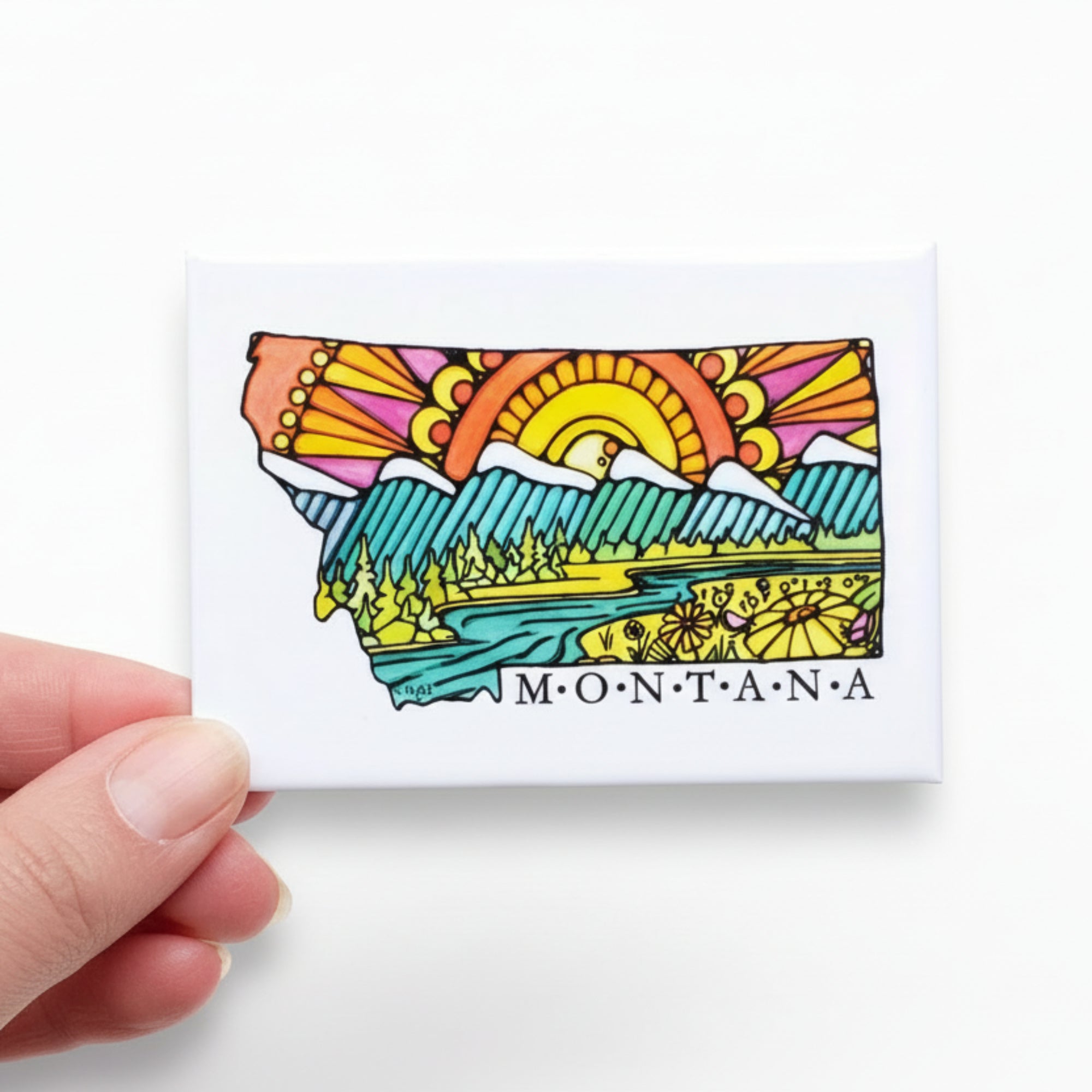 Colorful illustration of Montana on a fridge magnet that is white.