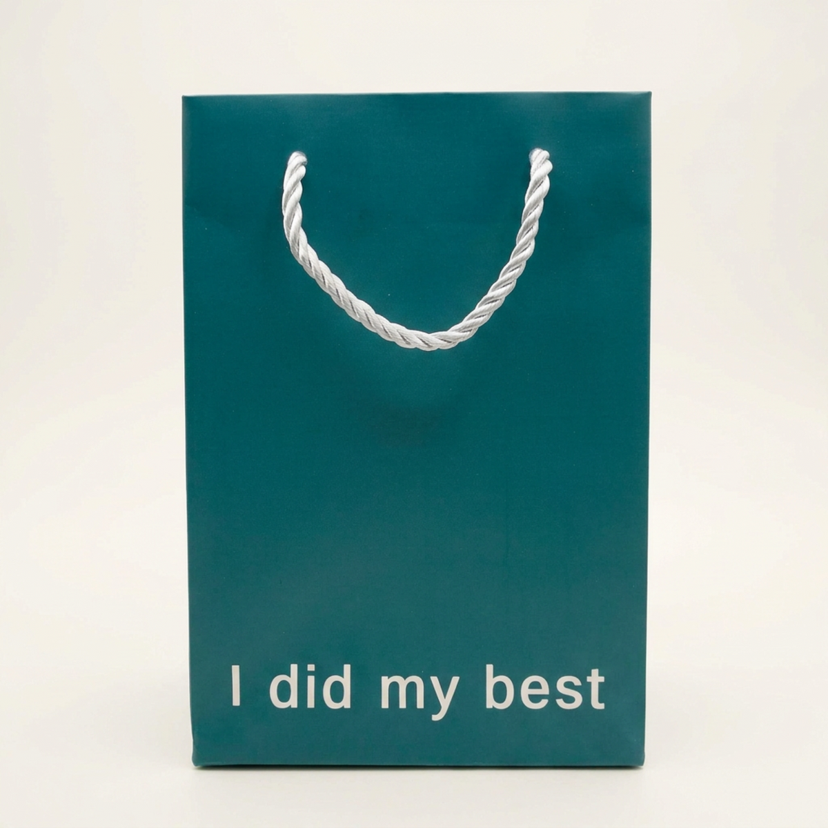 Dark teal small gift bag that says I Did My Best, shown on a white background, from The Ruddy Duck in Whitefish, Montana