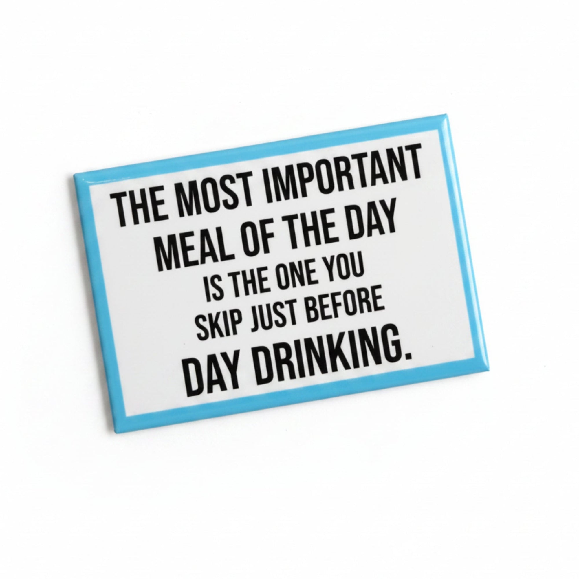 Card with humorous text about the most important meal before day drinking on a light background.