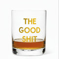Clear glass with yellow text 'THE GOOD SHIT' on a white background