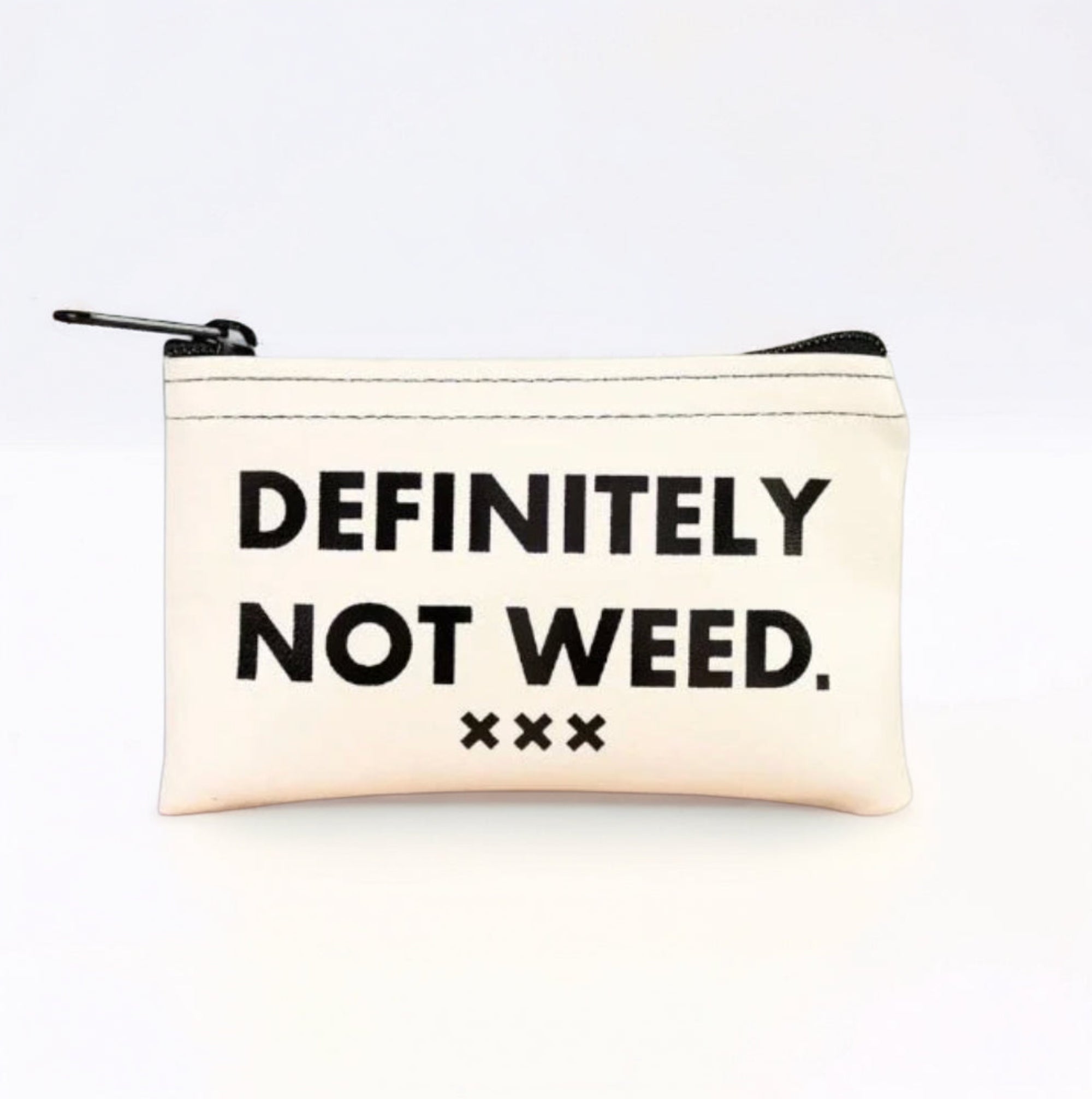 Beige pouch with 'DEFINITELY NOT WEED' text on a white background