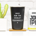 Black cup with 'Who Run the World? Squirrels!'