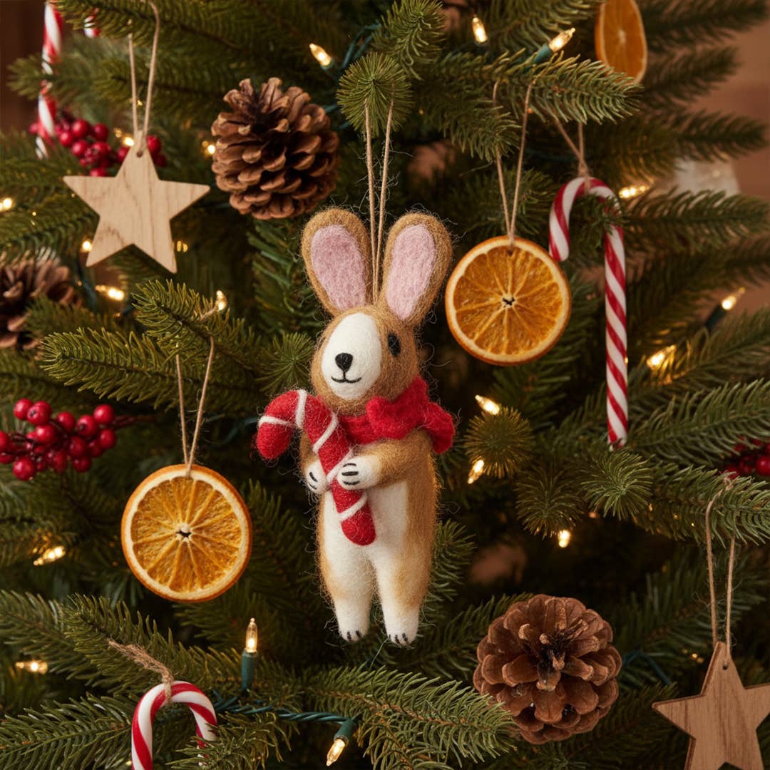 Handmade felt bunny Christmas ornament with knitted scarf and candy cane, from The Ruddy Duck in Whitefish, Montana