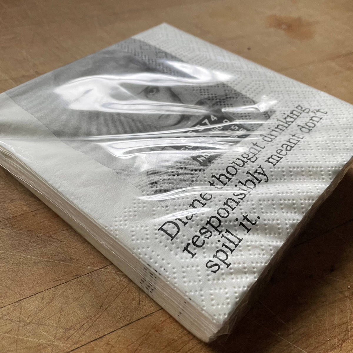 Diane Drinks Responsibly funny mugshot cocktail napkins, pack of 20, from The Ruddy Duck in Whitefish, Montana