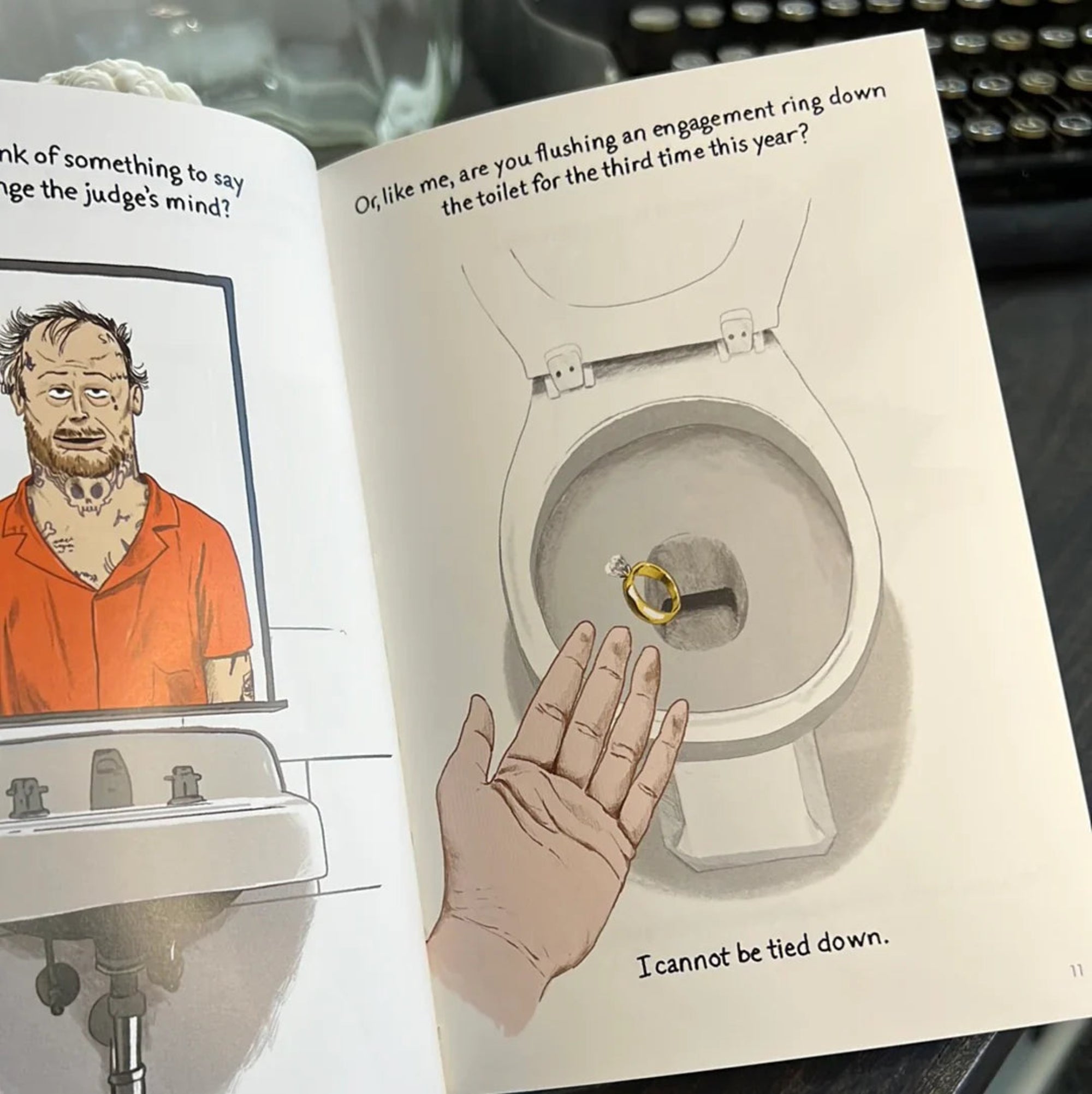 Open book with illustrations of a man in an orange shirt, a toilet with a ring, and a hand holding a ring.