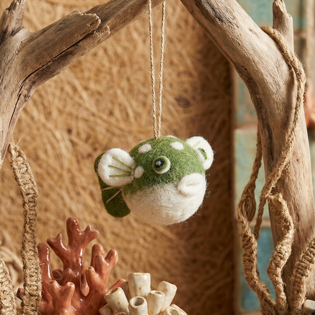 Handmade felt puffer fish ornament with bobble eyes, from The Ruddy Duck in Whitefish, Montana
