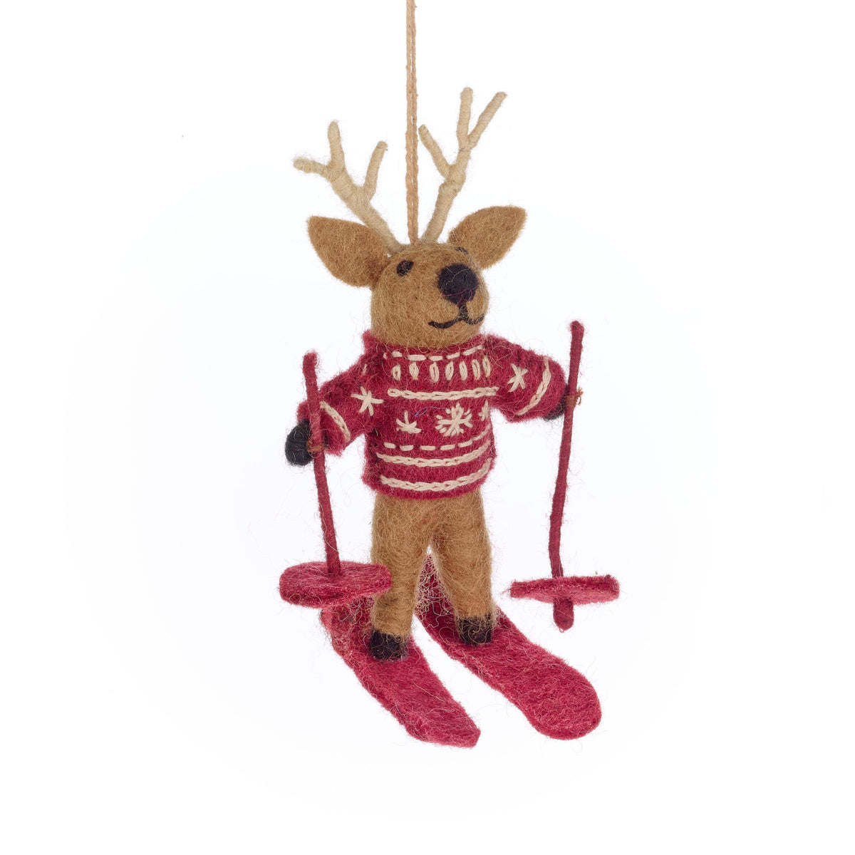 Handmade felt skiing reindeer Christmas ornament in fair isle sweater on red skis, from The Ruddy Duck in Whitefish, Montana