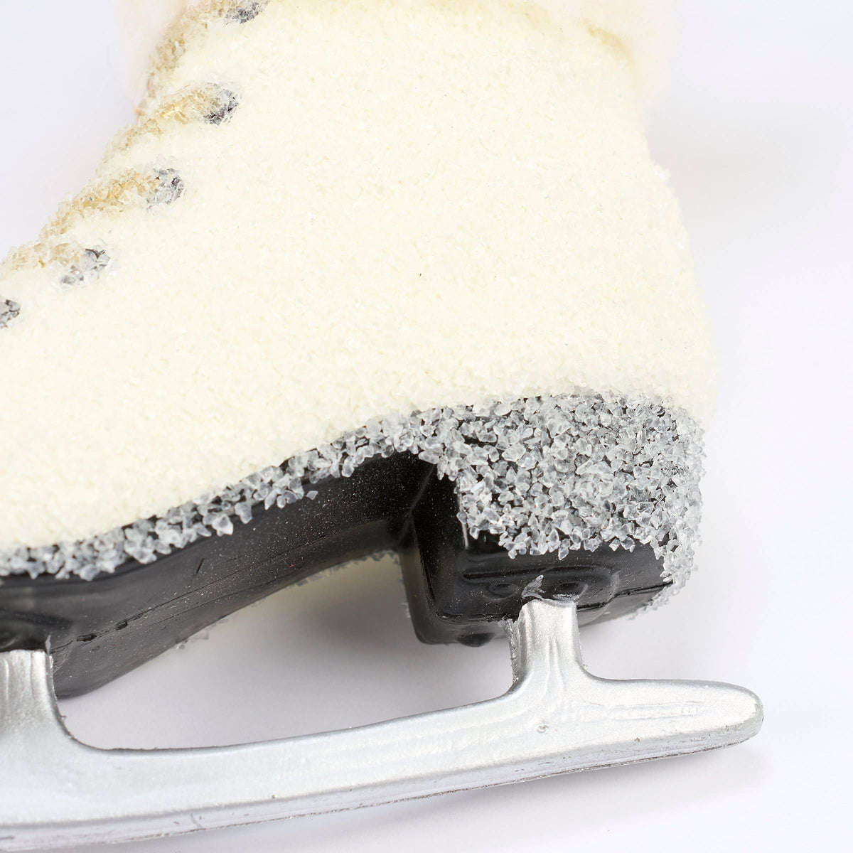 Vintage-style white ice skate Christmas ornament, alternate view, from The Ruddy Duck in Whitefish, Montana