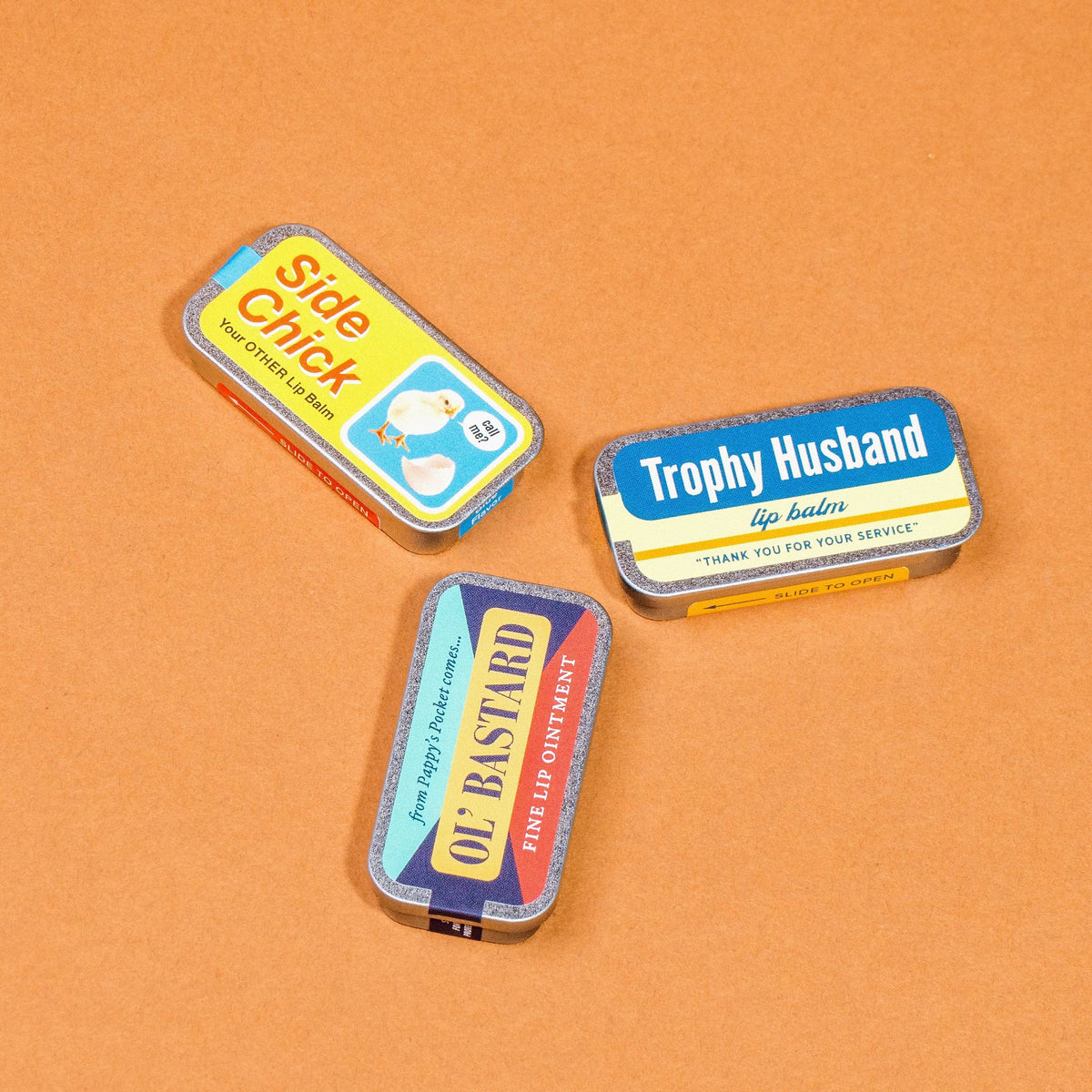 Trophy Husband blue raspberry lip balm in an old school metal tin by Whiskey River Soap Co., from The Ruddy Duck in Whitefish, Montana