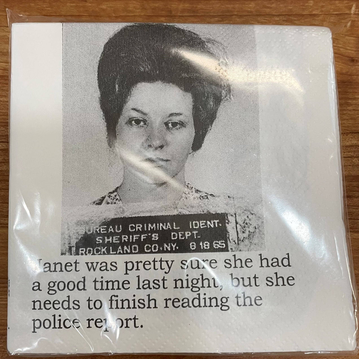 Janet's Police Report funny mugshot cocktail napkins, pack of 20, from The Ruddy Duck in Whitefish, Montana